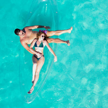 couples clear kayak photoshoot Turks and Caicos